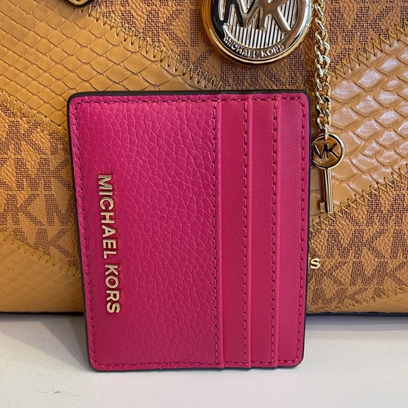 MICHAEL KORS
Large Pebbled Leather Card Holder Case
Electric Pink 
NWT - Picture 4 of 16